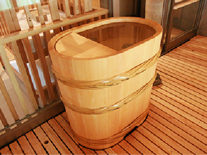 Small bath tub with hot water used to wash off your body after bathing.