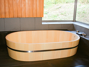 Ovular wooden bath